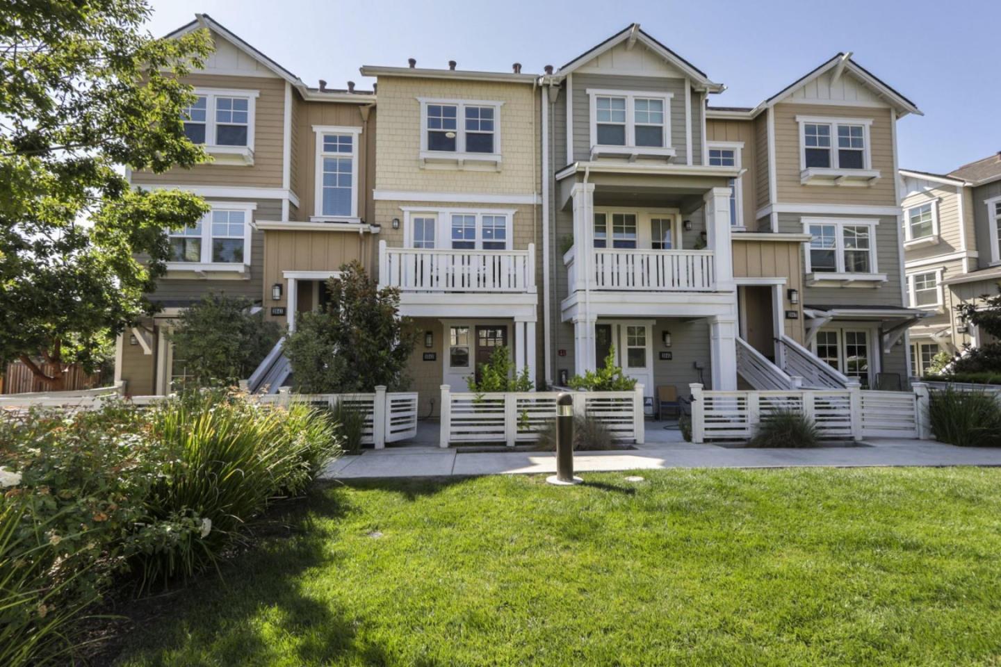 2043 Atlas Loop Mountain View, CA 94043 - Photo 40 of 42 a front view of a house with a yard table and chairs