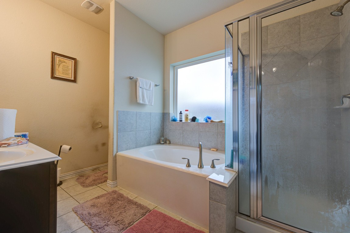 1510 Bella Garden Spring, TX 77373 - Photo 14 of 21 a bathroom with a tub and shower