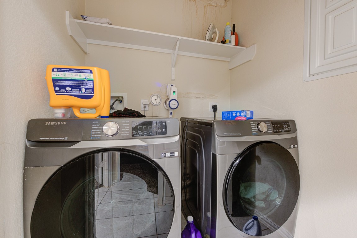 1510 Bella Garden Spring, TX 77373 - Photo 19 of 21 a utility room with dryer and washer