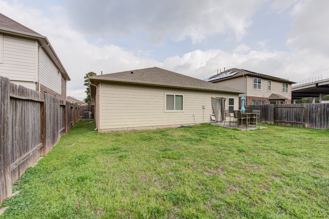 1510 Bella Garden Spring, TX 77373 - Photo 20 of 21 a view of a house with backyard and garden