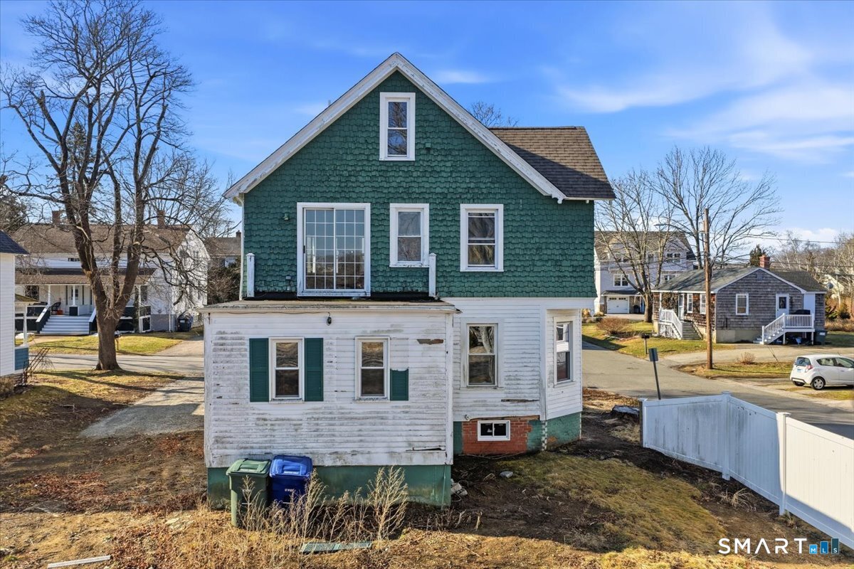 18 Maxson Street Groton, CT 06355 - Photo 3 of 39 a front view of a house with a yard