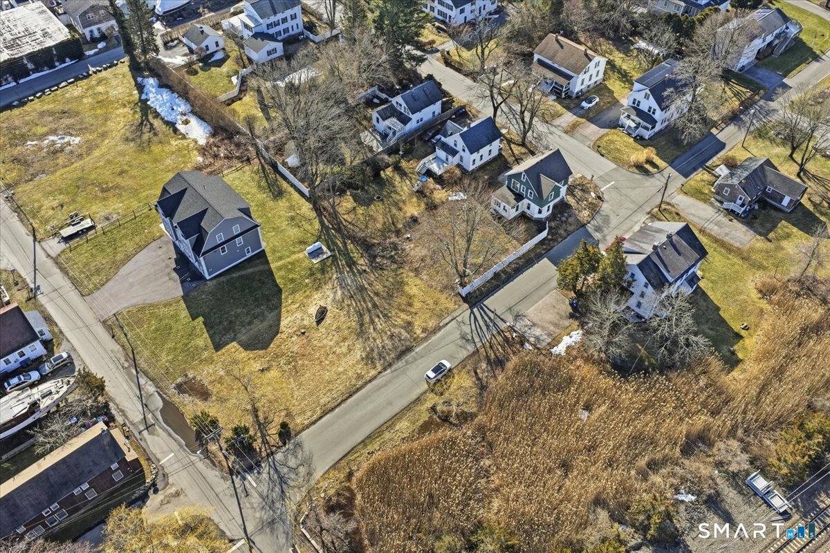 18 Maxson Street Groton, CT 06355 - Photo 7 of 39 an aerial view of a house with a yard
