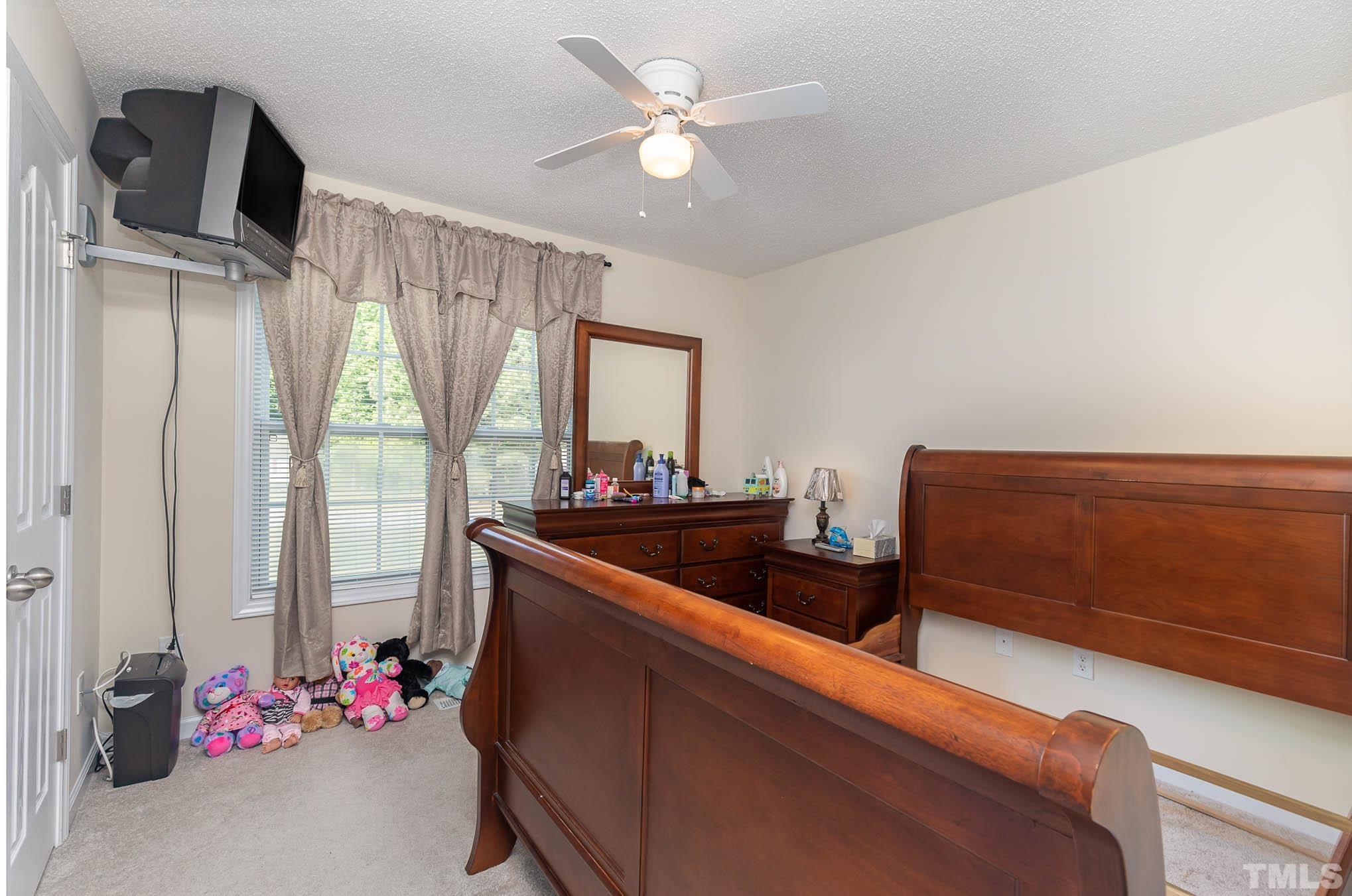 30 Rolling Cloud Drive Louisburg, NC 27549 - Photo 17 of 25 a room with bed and window