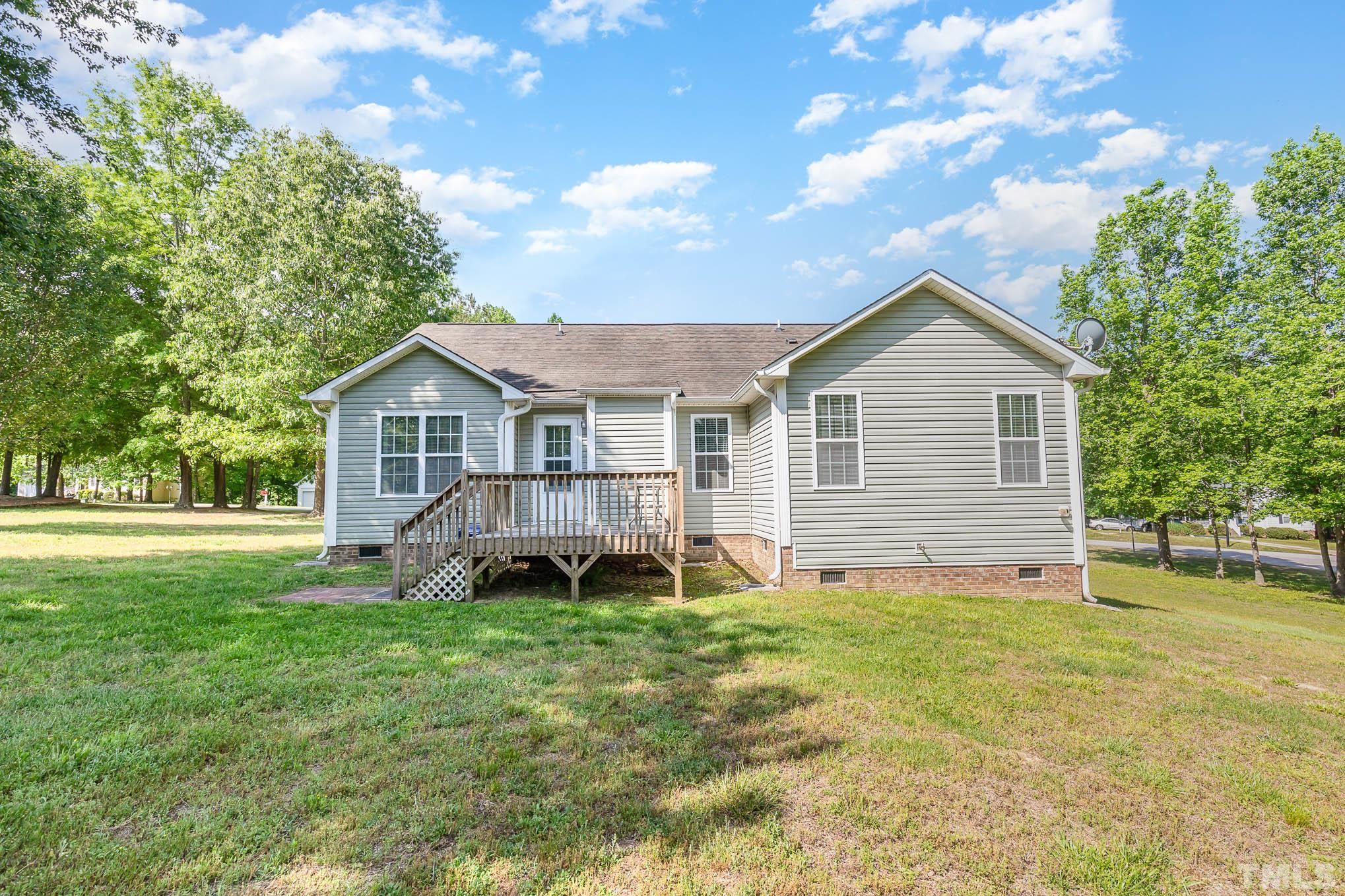 30 Rolling Cloud Drive Louisburg, NC 27549 - Photo 23 of 25 a view of a house with a yard