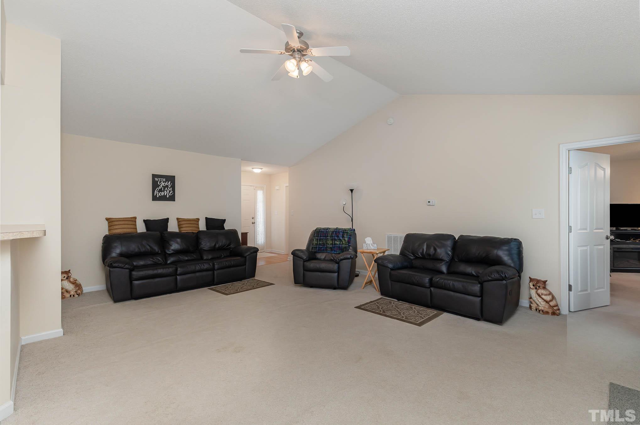 30 Rolling Cloud Drive Louisburg, NC 27549 - Photo 8 of 25 a living room with furniture