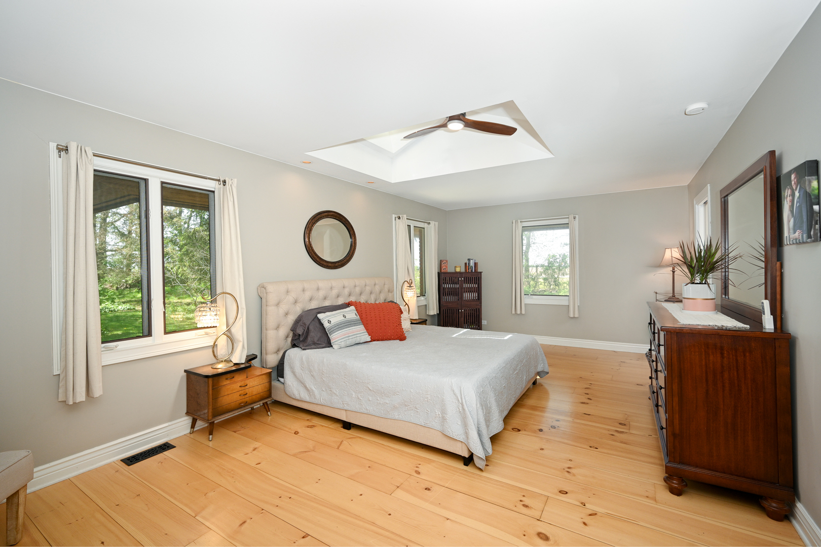 2588 # J Rock Creek Road Plano, IL 60545 - Photo 18 of 39 a bedroom with a bed and window