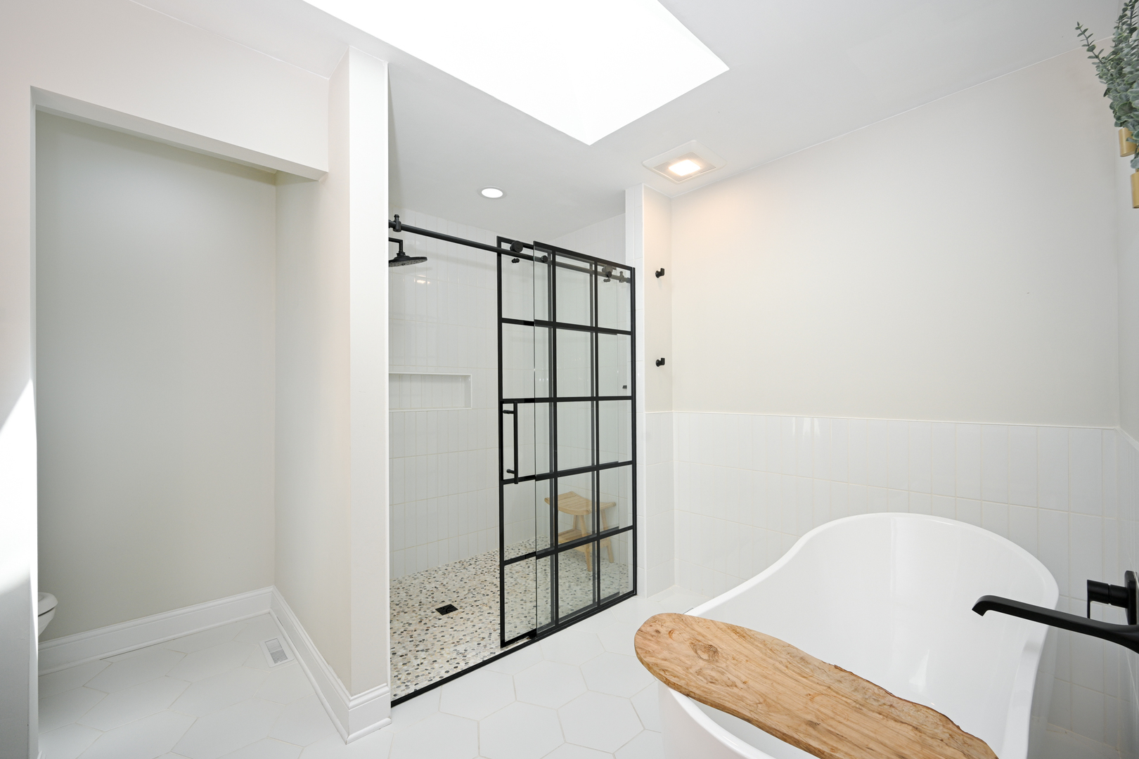 2588 # J Rock Creek Road Plano, IL 60545 - Photo 21 of 39 a bathroom with a toilet and a shower