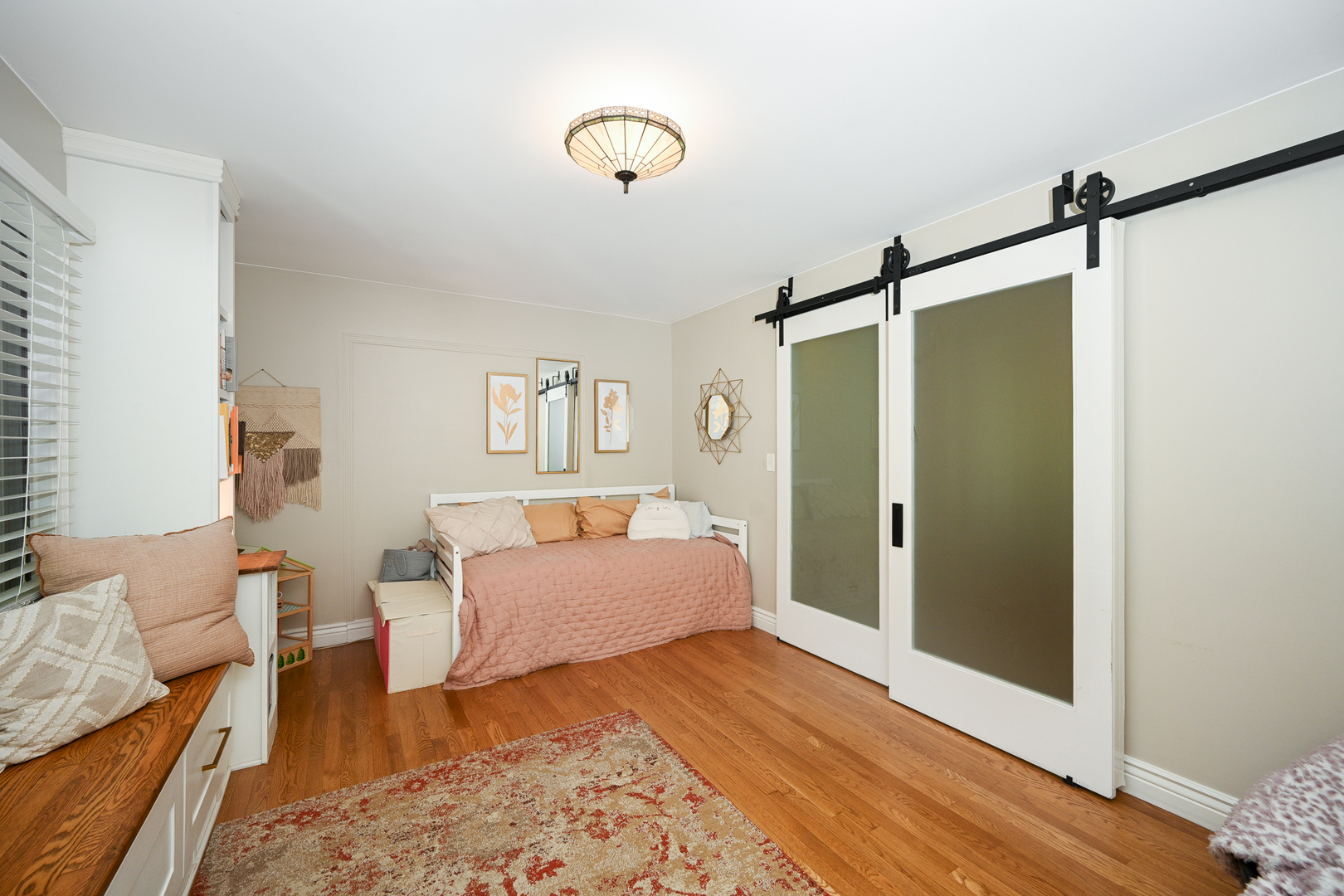 2588 # J Rock Creek Road Plano, IL 60545 - Photo 23 of 39 a spacious bedroom with a bed and a couch