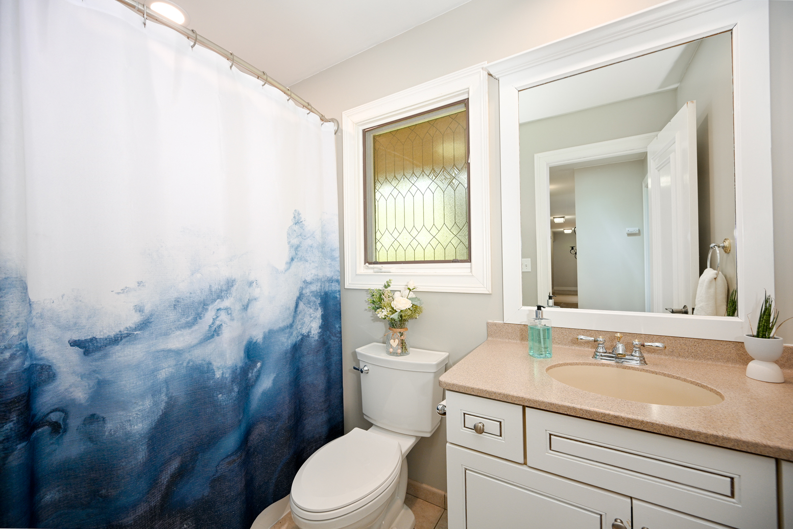 2588 # J Rock Creek Road Plano, IL 60545 - Photo 26 of 39 a bathroom with a granite countertop sink a toilet and a mirror