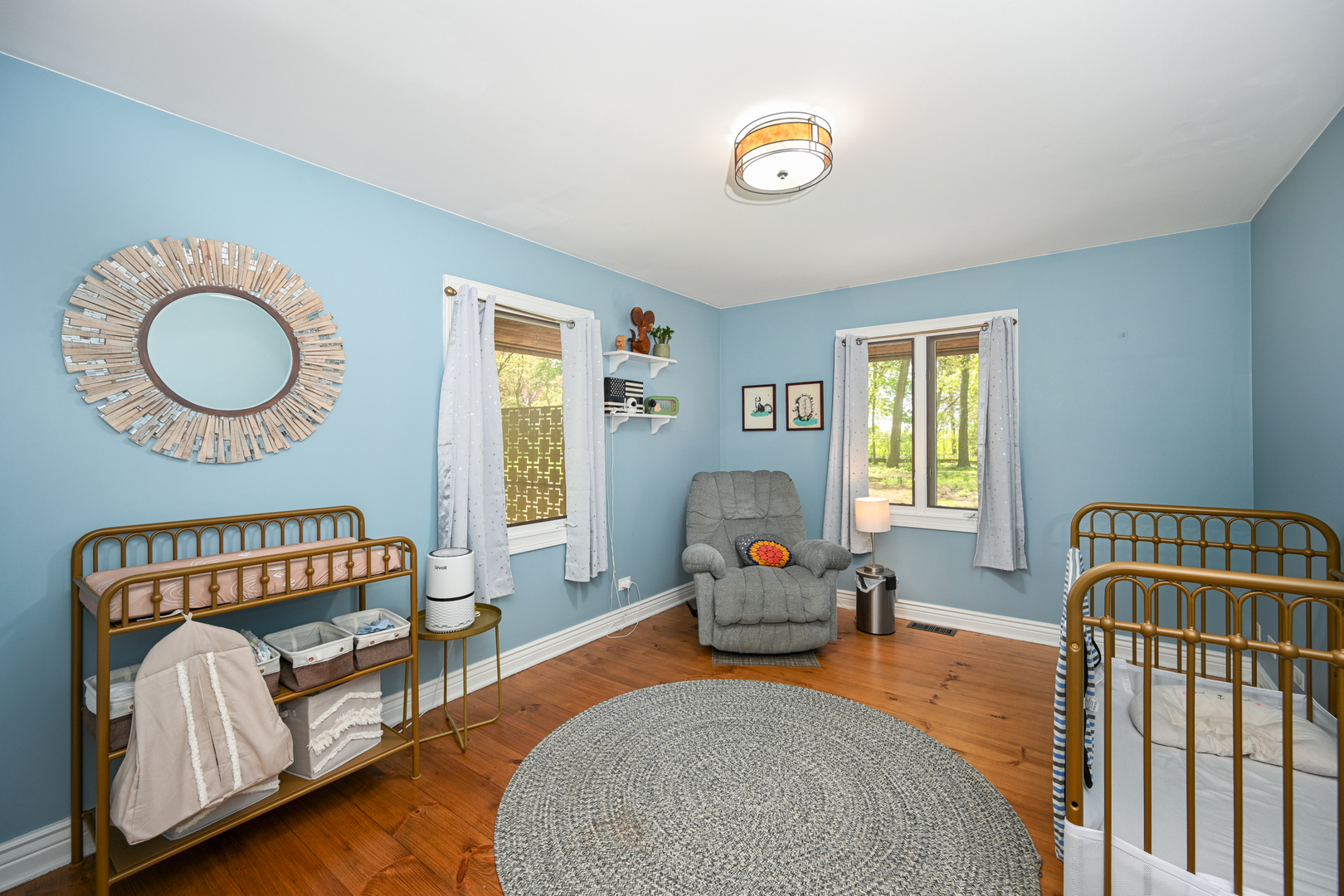 2588 # J Rock Creek Road Plano, IL 60545 - Photo 27 of 39 a bedroom with furniture and a window