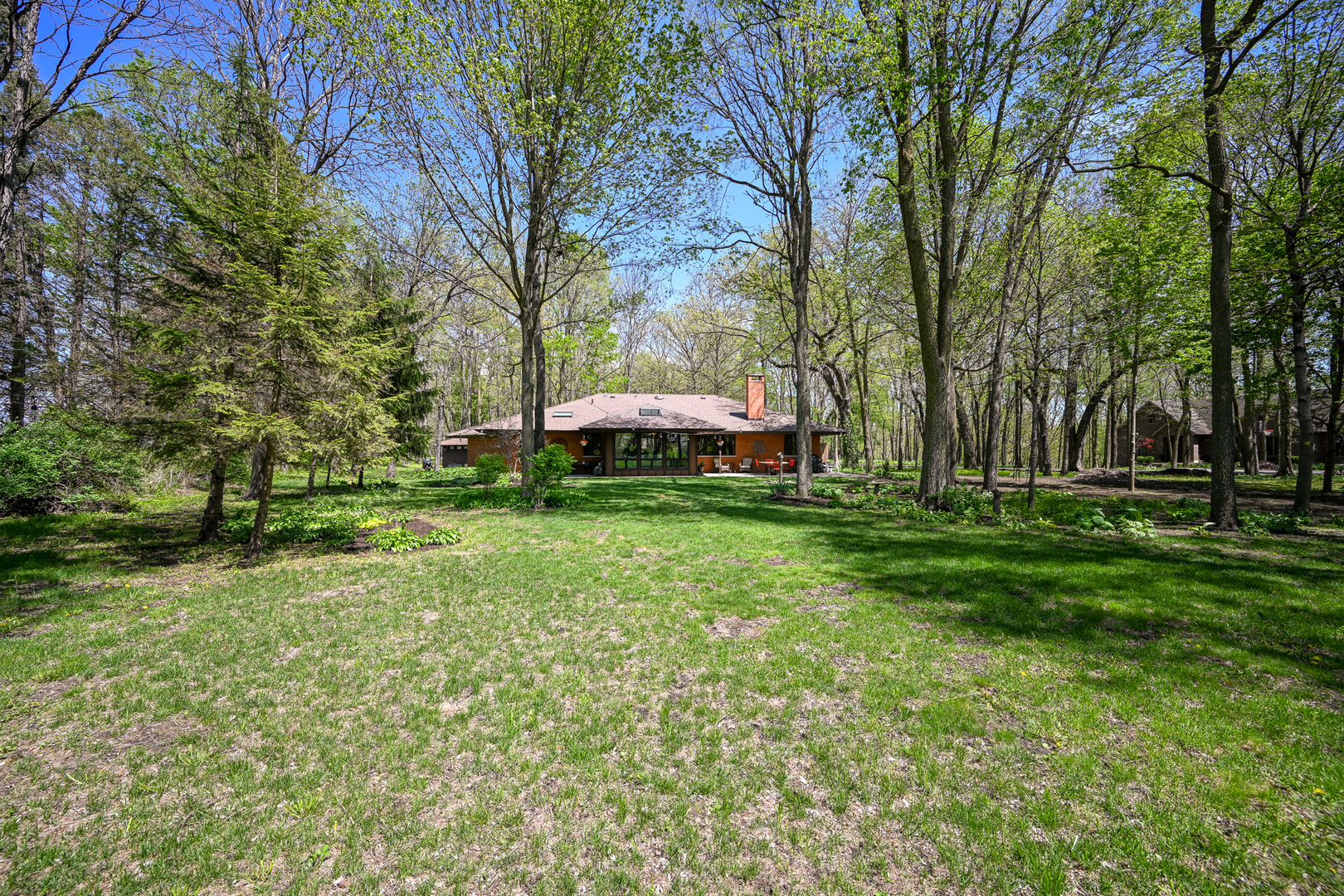 2588 # J Rock Creek Road Plano, IL 60545 - Photo 33 of 39 a view of a park with large trees