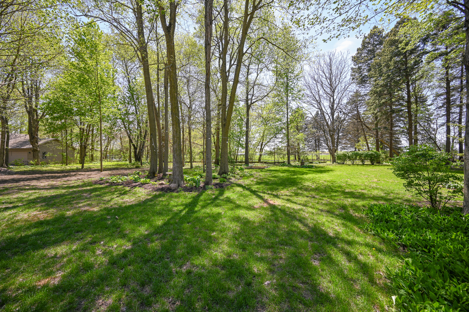 2588 # J Rock Creek Road Plano, IL 60545 - Photo 34 of 39 a view of a park with large trees
