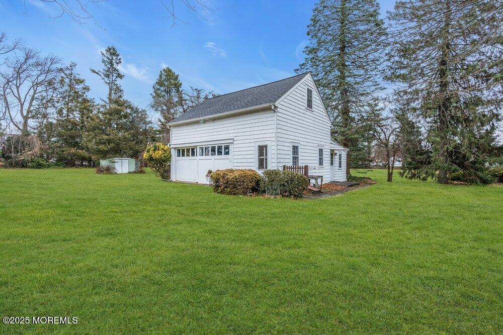 16 Robertsville Road Freehold, NJ 07728 - Photo 28 of 59 a house view with a garden space