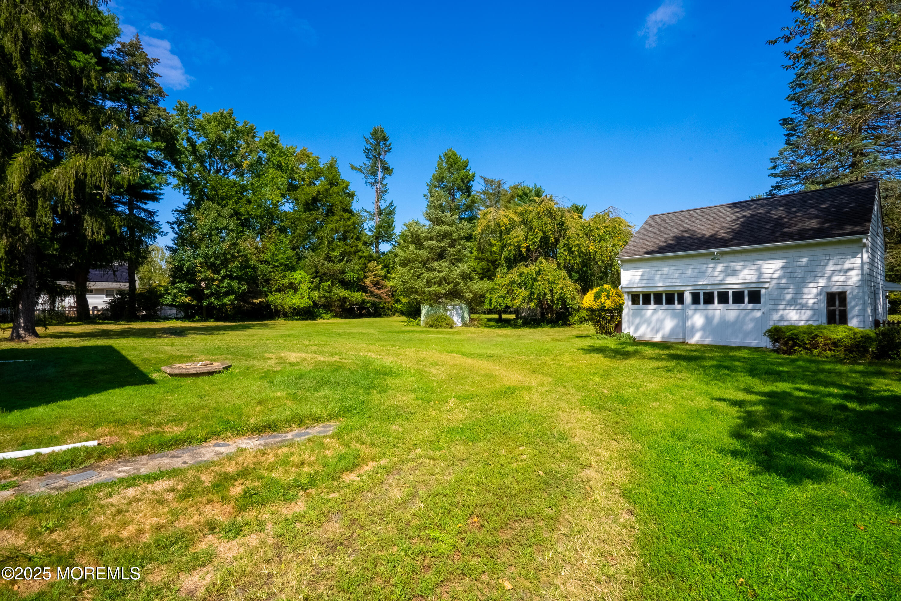 16 Robertsville Road Freehold, NJ 07728 - Photo 45 of 59 a view of house with swimming pool and garden