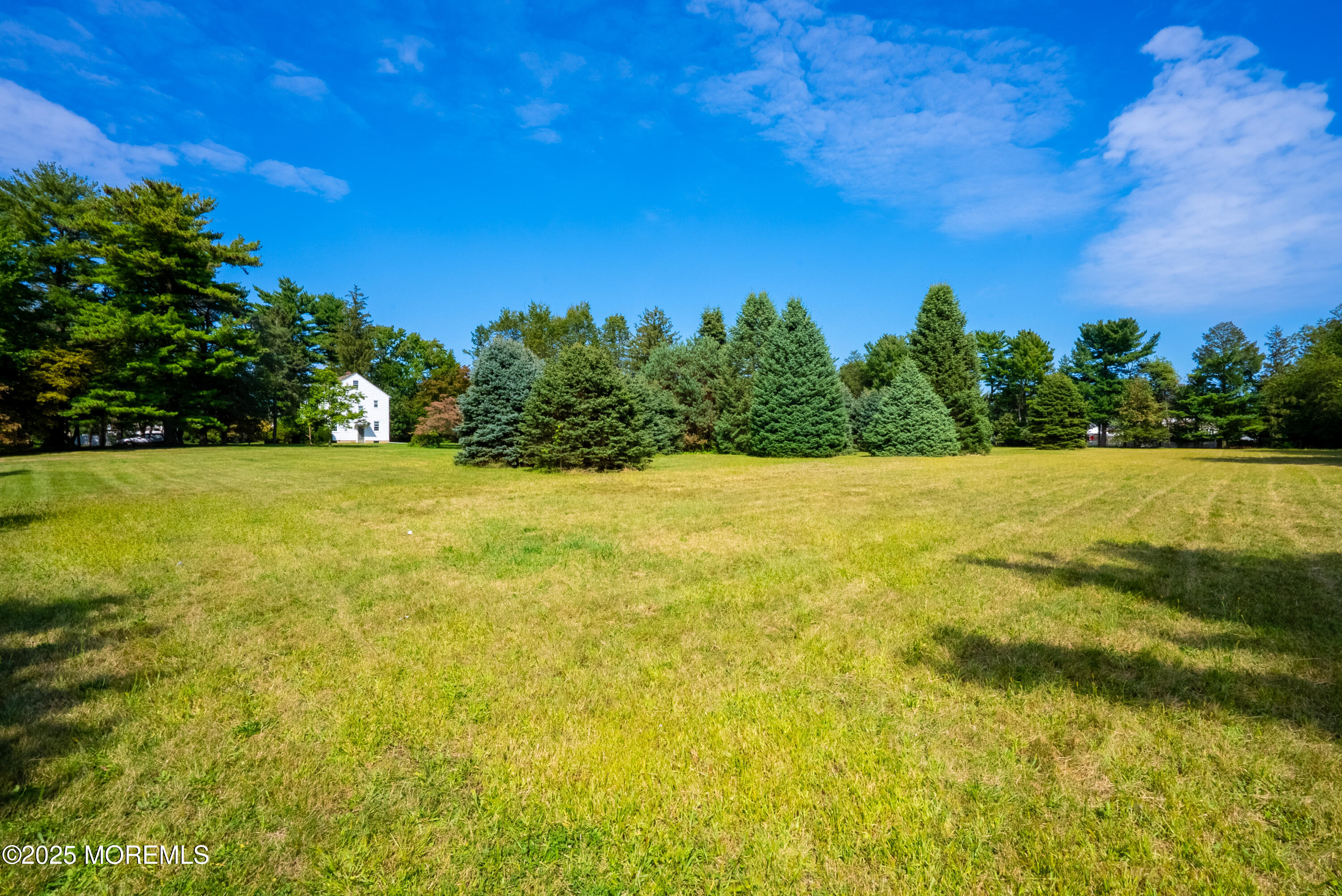 16 Robertsville Road Freehold, NJ 07728 - Photo 57 of 59 a view of yard with swimming pool and outdoor seating