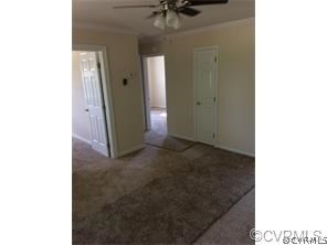 1750 Haskin Road, Unit 1 Goochland, VA 23063 - Photo 5 of 8 a view of a room with a ceiling fan