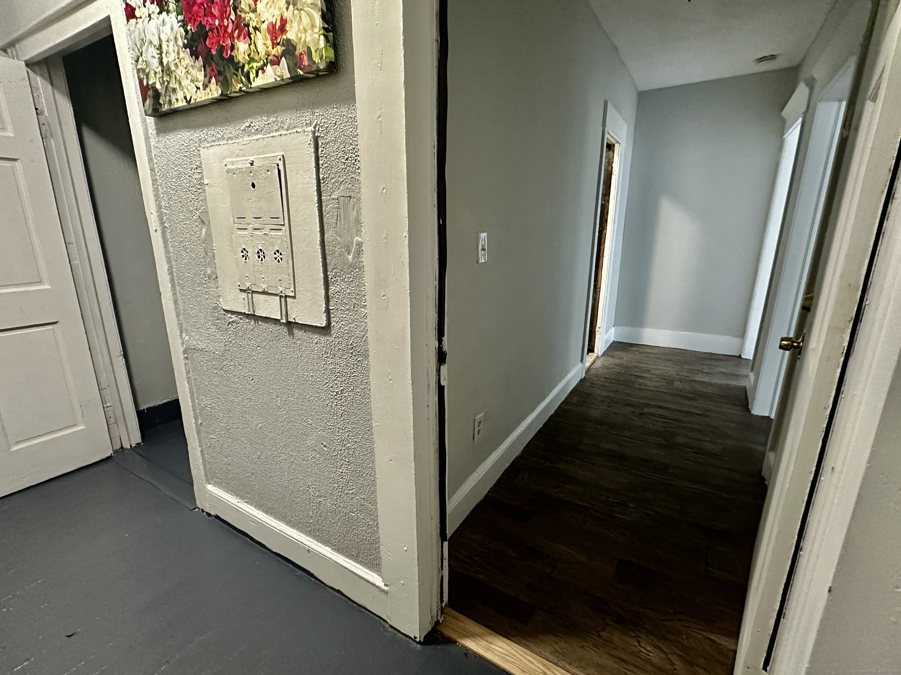 585 Winchester Avenue, Unit 1 New Haven, CT 06511 - Photo 12 of 12 a view of a hallway with wooden floor and closet
