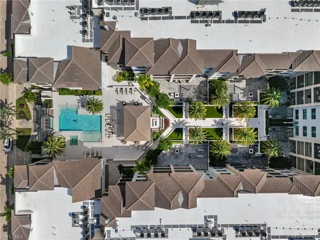 a view of multiple houses with a city street