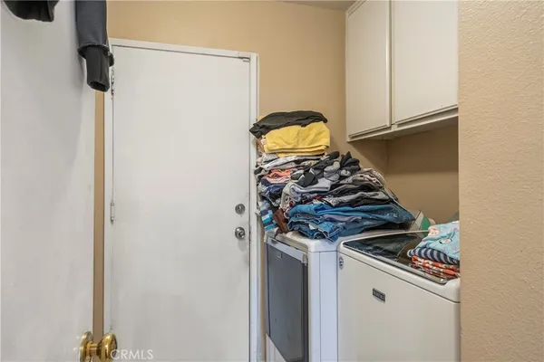 a close view of a stove and a microwave
