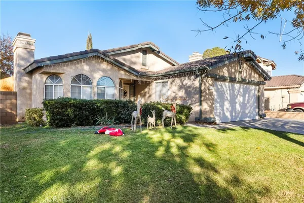 a front view of a house with swimming pool