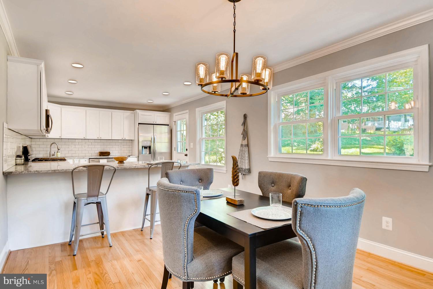 817 Ridgeleigh Road Baltimore, MD 21212 - Photo 14 of 25 a view of a dining room with furniture window and outside view