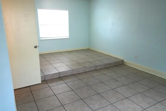 an empty room with a window