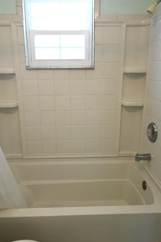 a bathroom with a bathtub