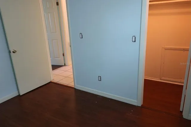 an empty room and wooden floor