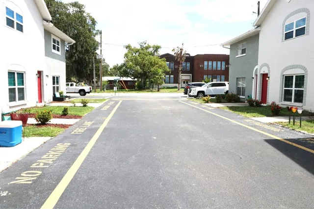 a view of a street with cars