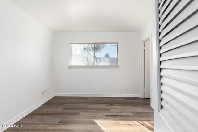 a view of entryway with wooden floor