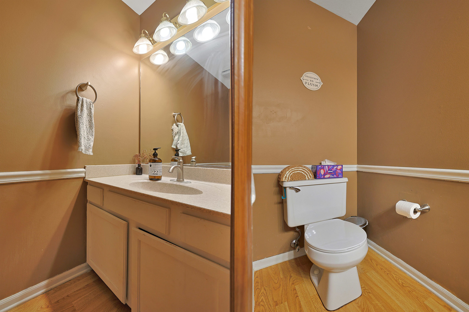 710 Cimarron Drive Cary, IL 60013 - Photo 20 of 31 a bathroom with a toilet sink and mirror