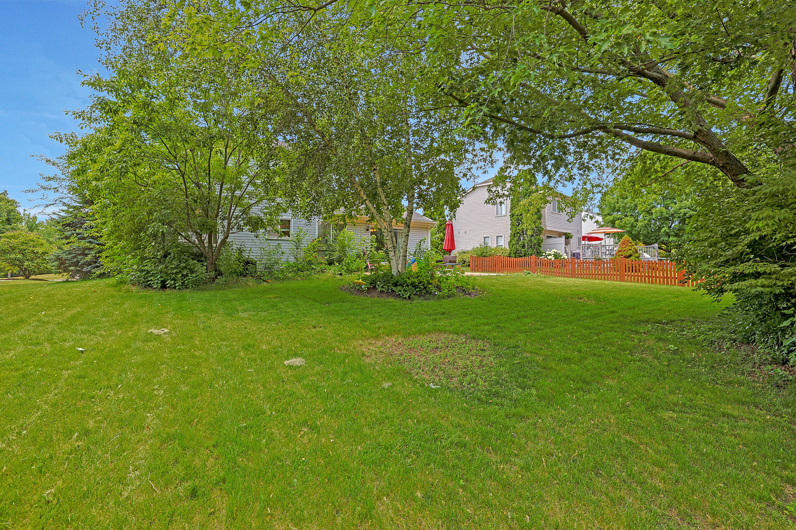 710 Cimarron Drive Cary, IL 60013 - Photo 23 of 31 a view of yard with green space and trees