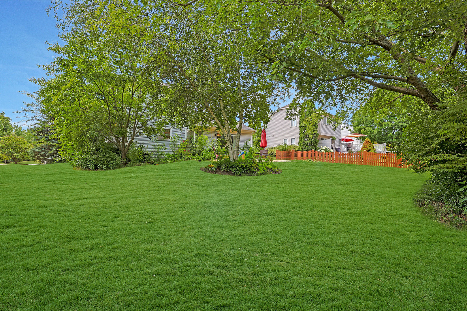 710 Cimarron Drive Cary, IL 60013 - Photo 30 of 31 a view of a backyard with large trees