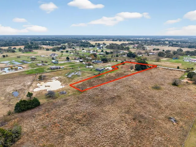 a view of lake with green space