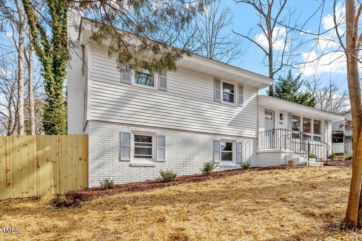 3408 Brentwood Road Raleigh, NC 27604 - Photo 29 of 41 a front view of a house with a yard