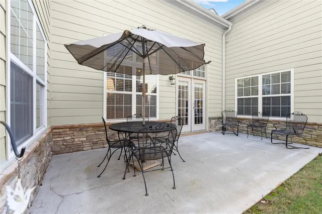 a table and chairs in the patio