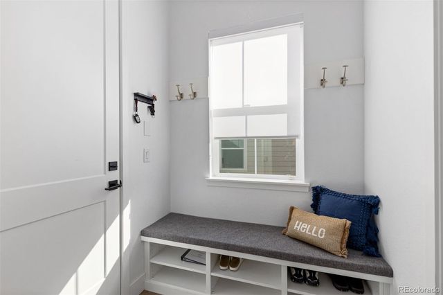 a room with chair and window