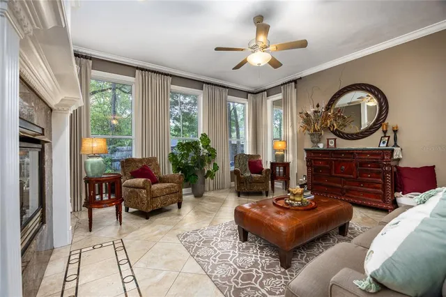 a swimming pool with outdoor seating and garden