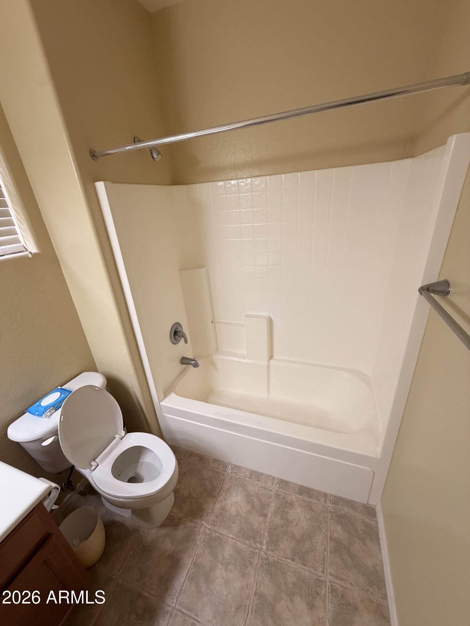 19466 East Reins Road Queen Creek, AZ 85142 - Photo 8 of 10 a bathroom with a sink a toilet and a shower