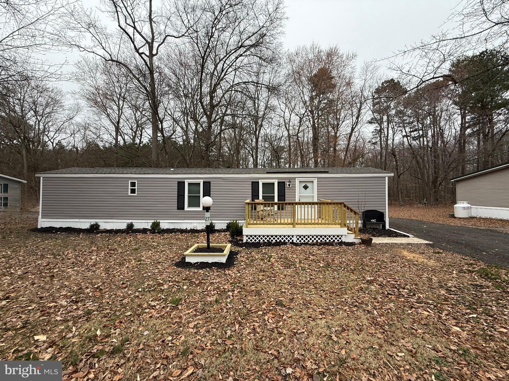 a house view with a backyard space