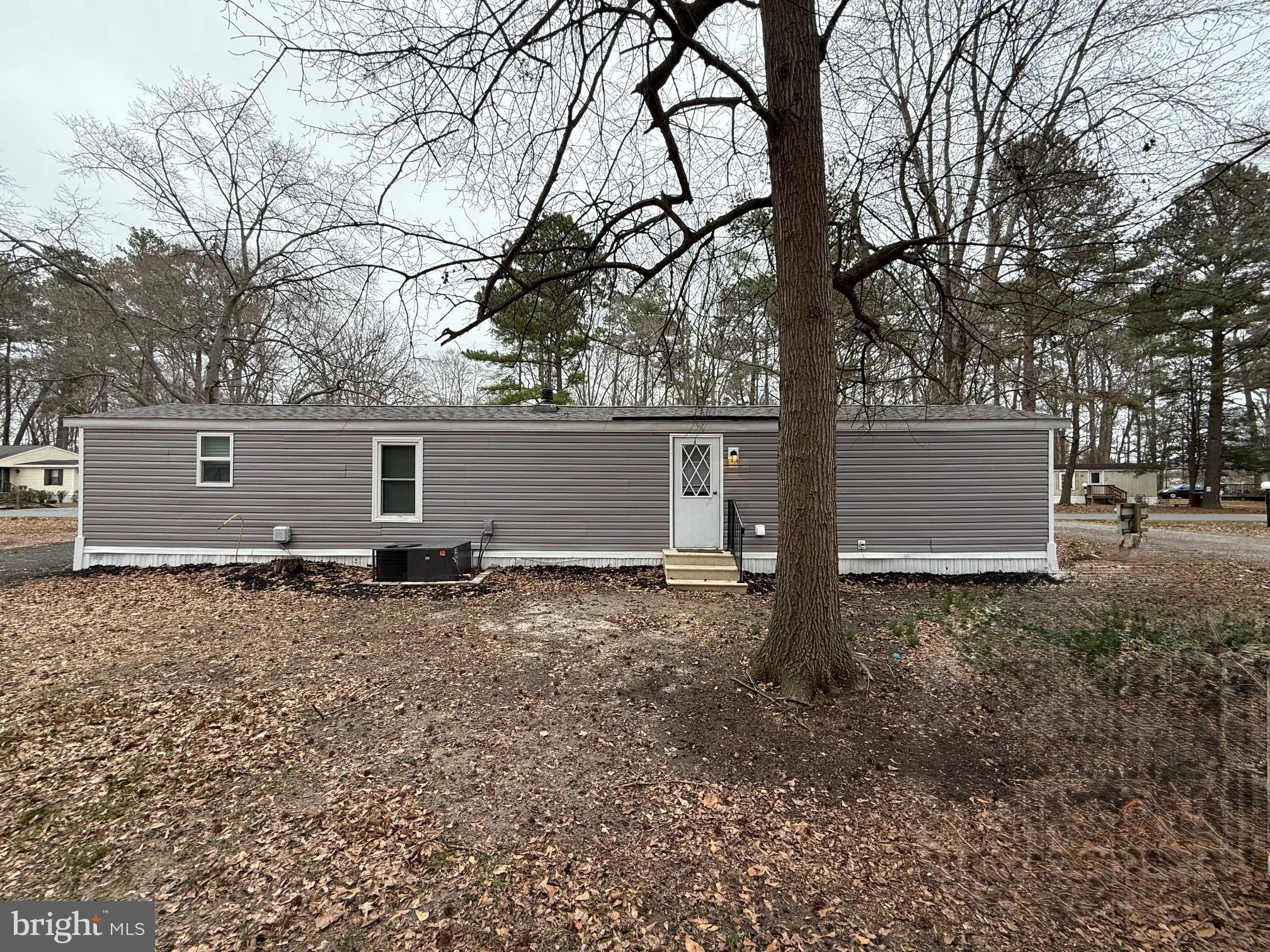 21182 Marsh Creek Road Preston, MD 21655 - Photo 8 of 9 front view of house with a trees