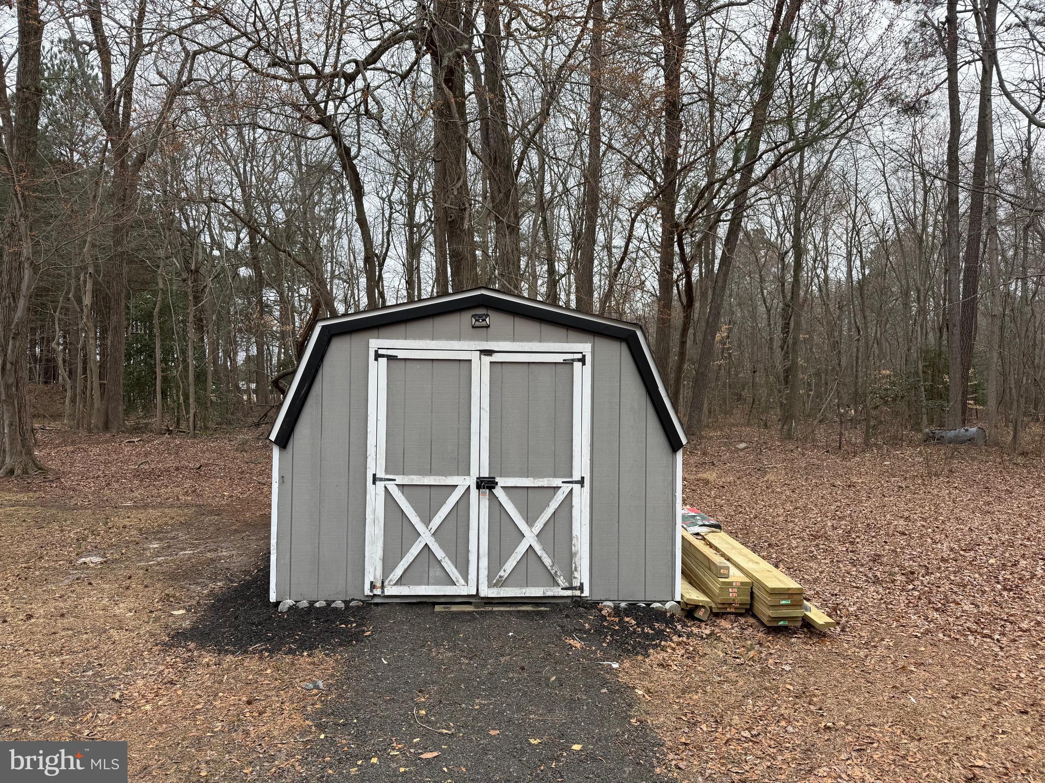 21182 Marsh Creek Road Preston, MD 21655 - Photo 9 of 9 a house with trees in the background