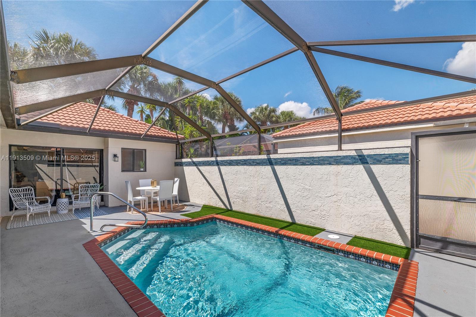 701 Sea Oats Drive, Unit D1 Juno Beach, FL 33408 - Photo 17 of 27 a view of outdoor space yard deck and patio