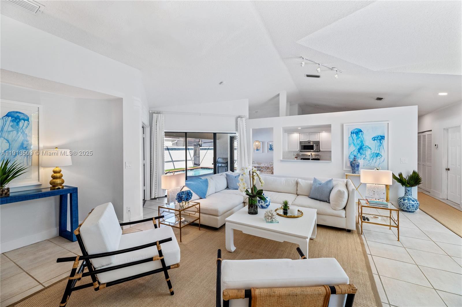 701 Sea Oats Drive, Unit D1 Juno Beach, FL 33408 - Photo 7 of 27 a living room with furniture and a window