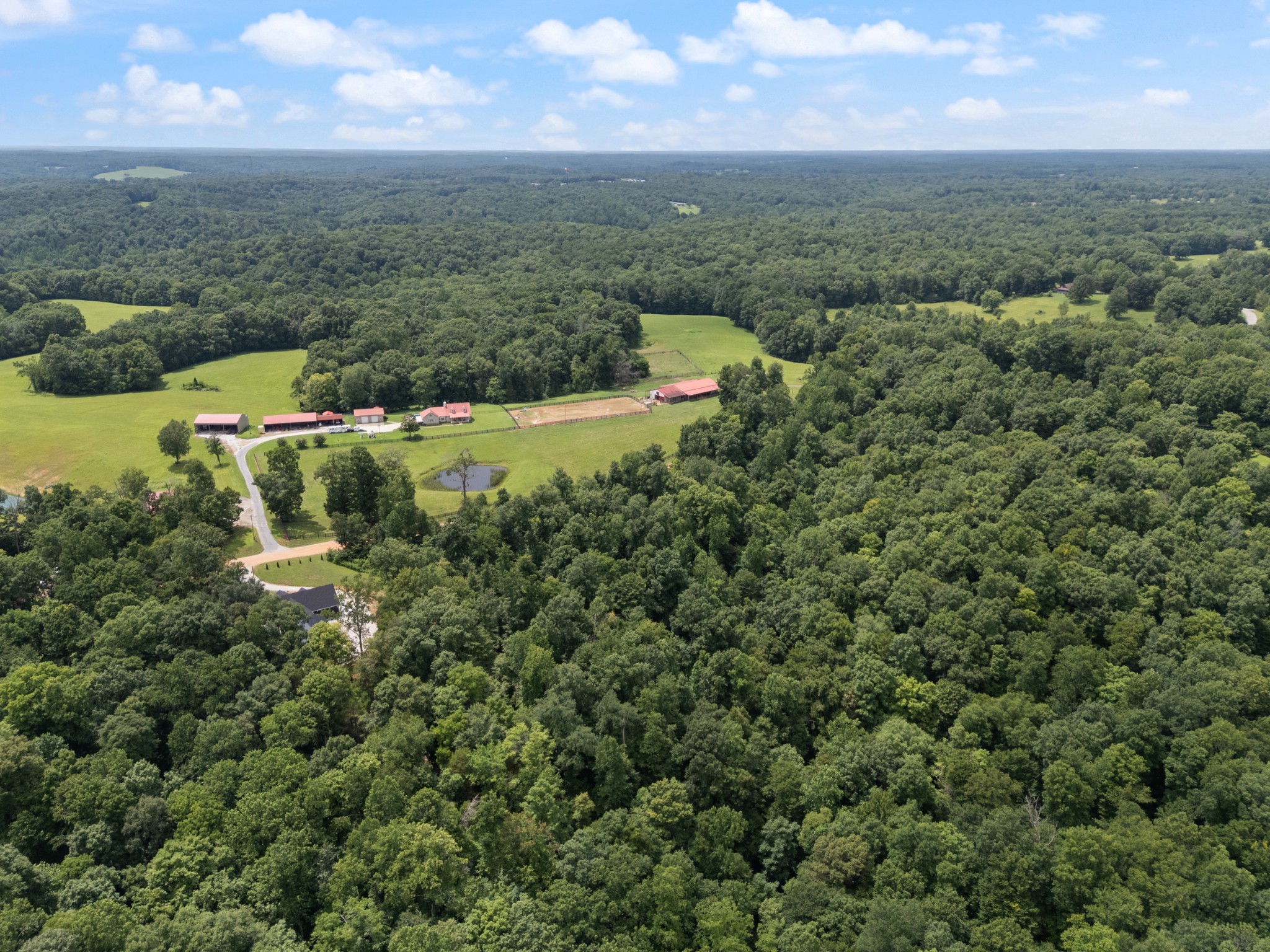 7922 East Plunders Creek Road Dickson, TN 37055 - Photo 77 of 86 an aerial view of a houses with a yard