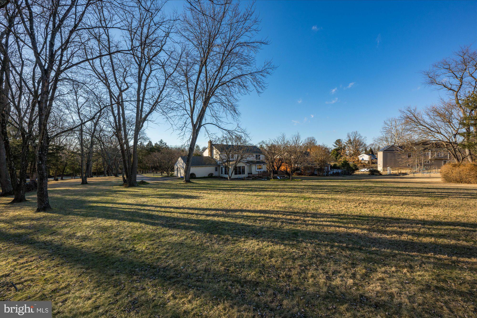 13321 Glen Mill Road Rockville, MD 20850 - Photo 28 of 31 a view of road with large trees
