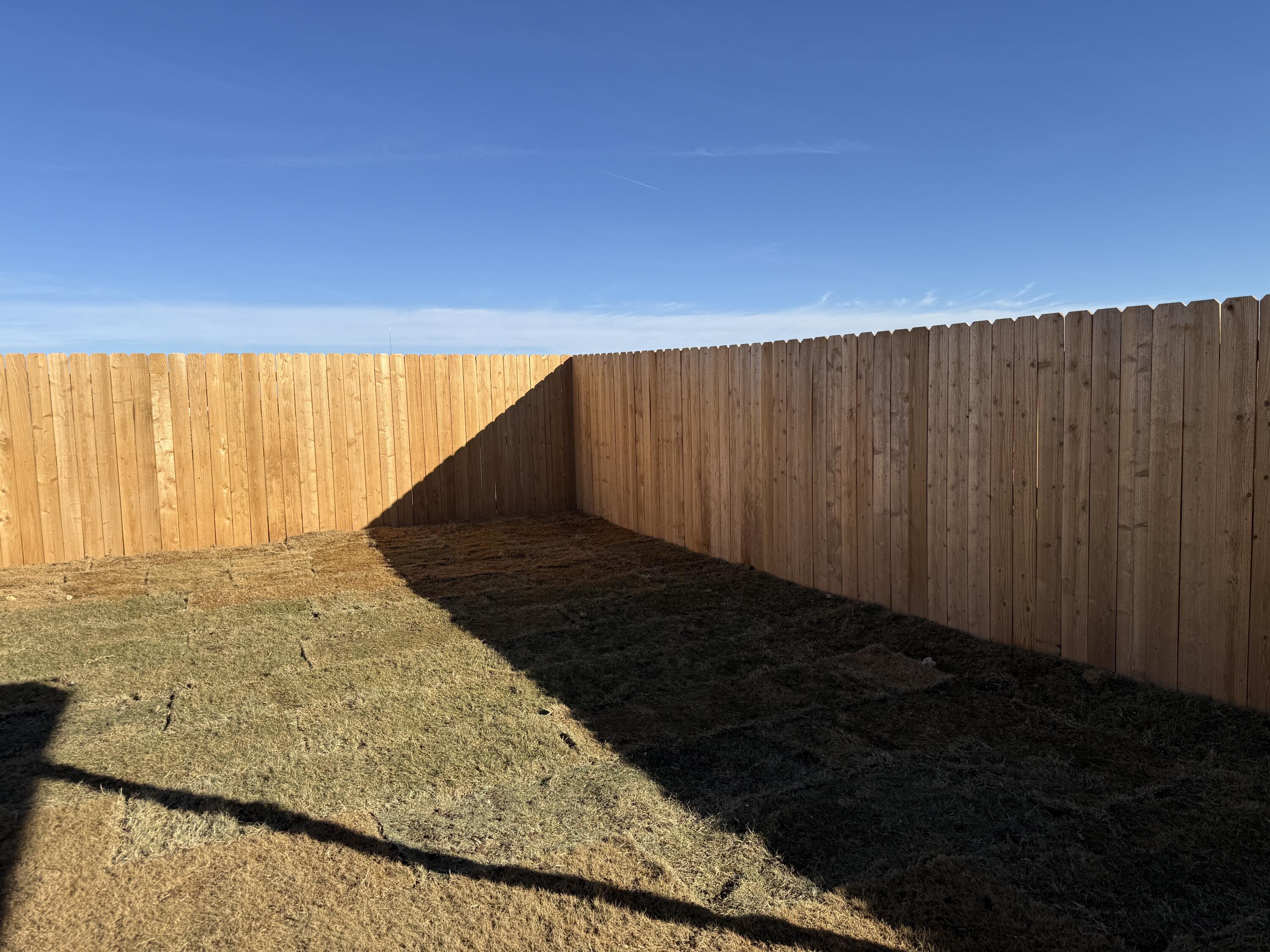 3104 138th Place Lubbock, TX 79423 - Photo 11 of 11 a view of an empty room and wooden floor