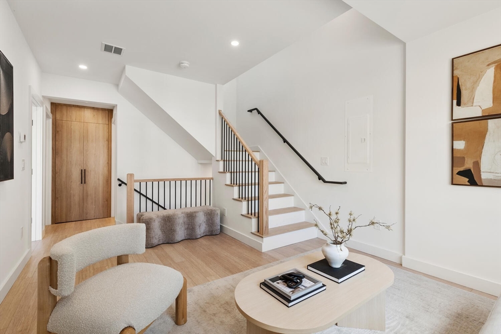 6 Wyman Court, Unit 6 Winchester, MA 01890 - Photo 12 of 35 a living room with furniture