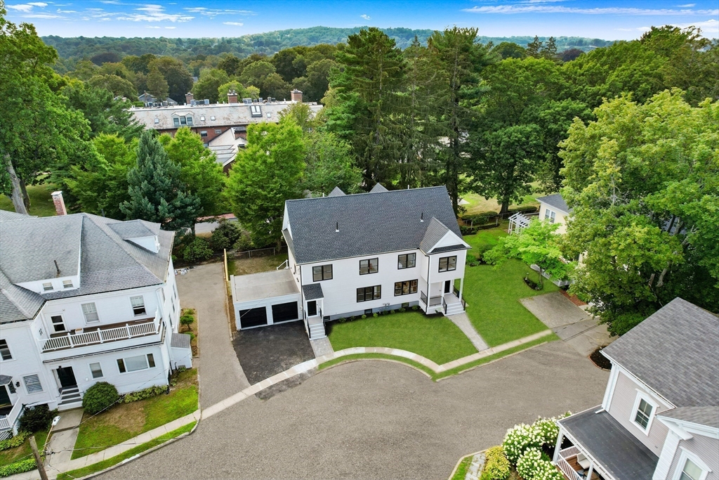 6 Wyman Court, Unit 6 Winchester, MA 01890 - Photo 31 of 35 an aerial view of a house with a garden