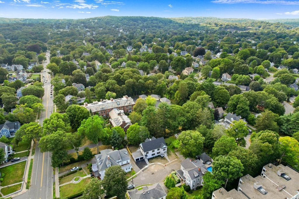 6 Wyman Court, Unit 6 Winchester, MA 01890 - Photo 33 of 35 an aerial view of a houses with a yard
